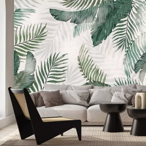 Papier peint  Feuilles exotiques sur texture béton