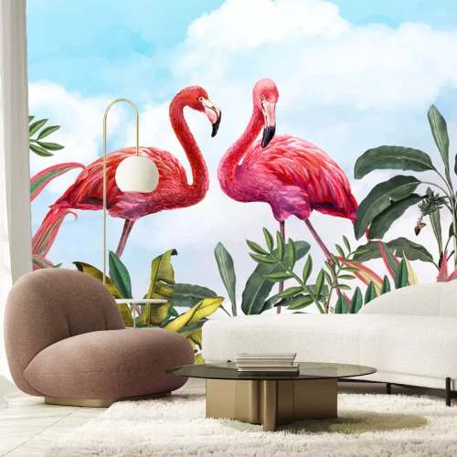 Papier peint  Flamants roses et feuilles tropicales contre le ciel