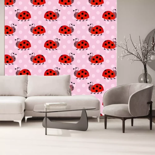 Sticker  De charmantes coccinelles sur fond rose