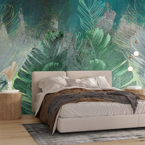 Papier peint  Feuilles tropicales sur un fond en béton