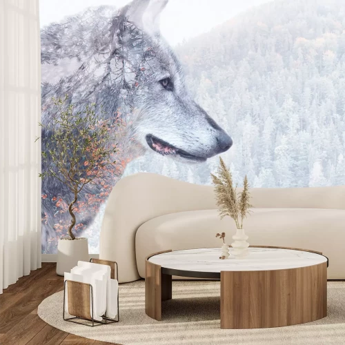 Papier peint  Un loup sur fond de paysage forestier dans un décor hivernal