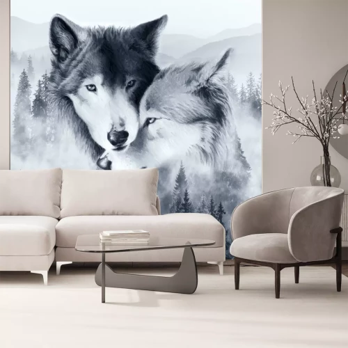 Papier peint  Une paire de loups sur fond de paysage forestier brumeux