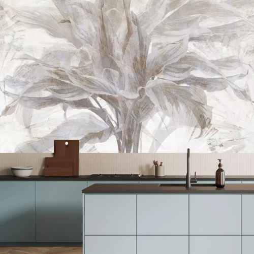 Papier peint  Feuilles tropicales sur fond de béton clair