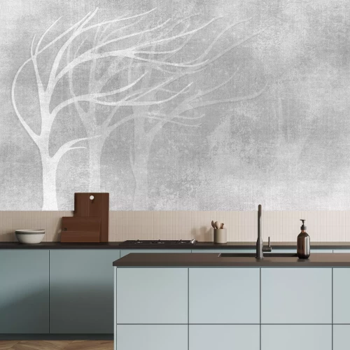 Papier peint  Silhouettes d'arbres sur une texture de béton