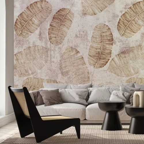 Papier peint  Grandes feuilles sur fond de béton gris