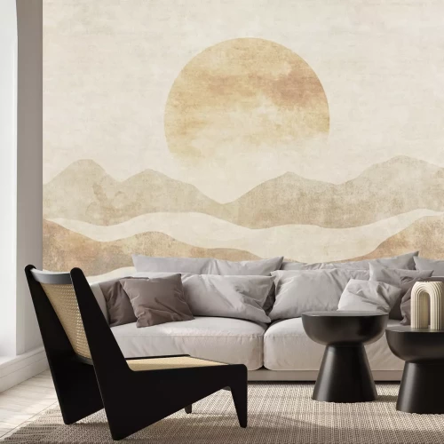 Papier peint  Le soleil se couchant derrière un paysage de montagne