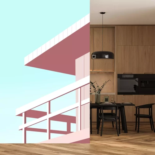 Papier peint  Une maison rose en bord de mer se détachant sur un ciel bleu