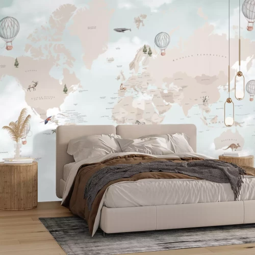 Papier peint  Carte du monde pour enfants sur fond de ciel avec des nuages