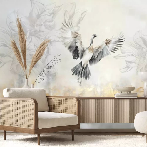 Papier peint  Oiseau volant sur un fond de végétation