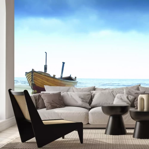 Papier peint  Bateau en bois sur la plage au bord de la mer