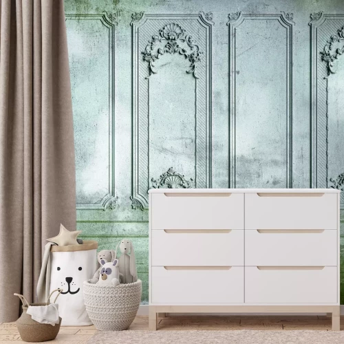 Papier peint  Stuc baroque sur un mur gris