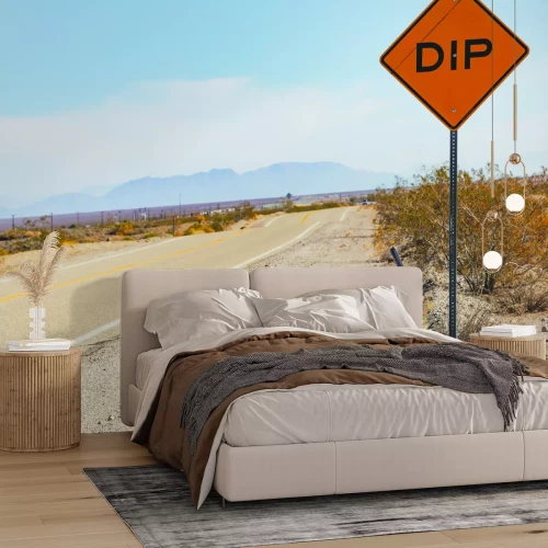 Papier peint  Route au milieu du désert avec des montagnes en arrière-plan