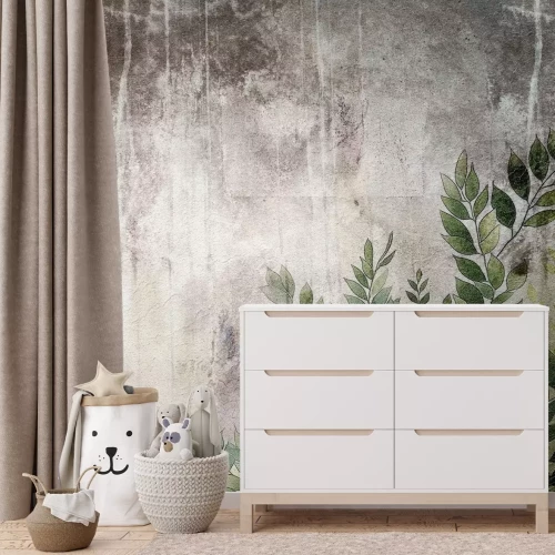 Papier peint  Feuilles vertes sur béton gris