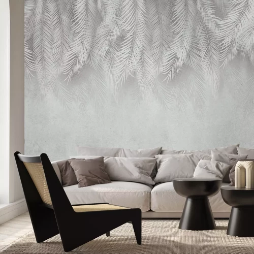 Papier peint  Feuilles de palmier blanches sur fond en béton avec un effet grunge