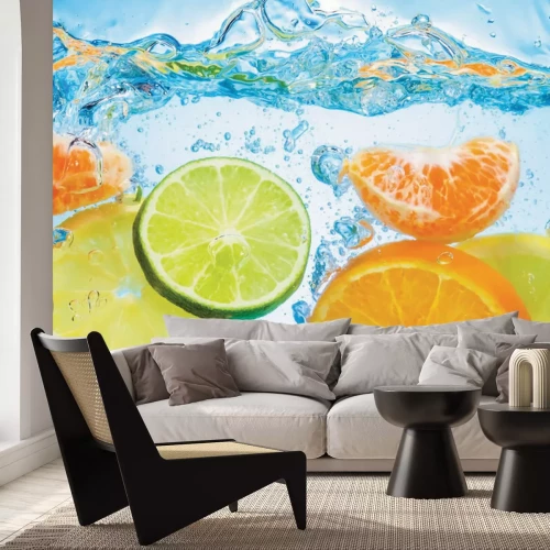 Papier peint  Citrons et oranges tombant dans l'eau