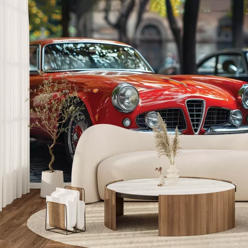 Papier peint  Voiture classique rouge dans un décor urbain