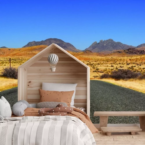 Papier peint  Route en béton traversant le milieu du désert