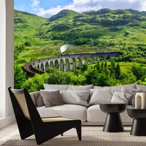 Papier peint  Train roulant sur un pont parmi les montagnes