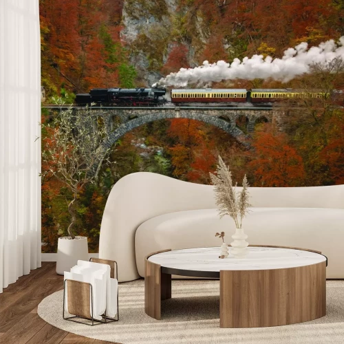 Papier peint  Train sur un pont dans une forêt d'automne