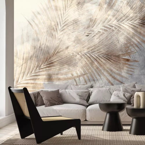 Papier peint  Feuilles de Palmier Beige sur un Fond en Béton dans un Style Industriel