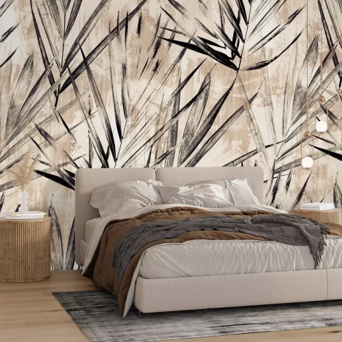 Papier peint  Feuilles de palmier noires sur un mur beige