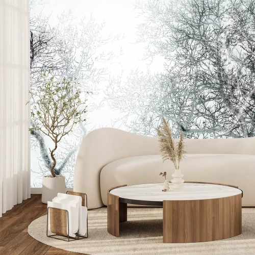 Papier peint  Forêt en noir et blanc avec vue sur les branches des arbres