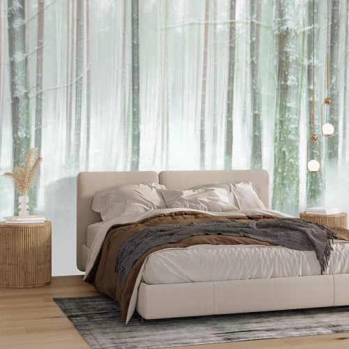 Papier peint  Troncs d'arbres sous une épaisse neige blanche