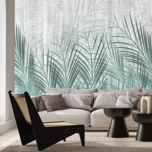 Papier peint  Feuilles de palmier vertes sur béton
