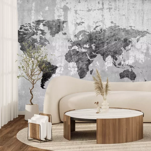 Papier peint  Carte du monde monochrome sur une texture en béton