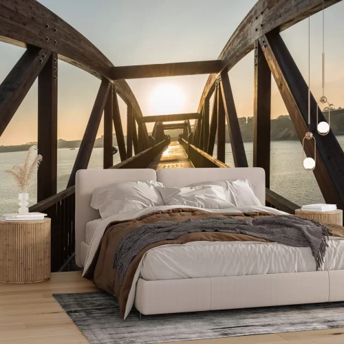 Papier peint  Pont en bois au-dessus de la rivière sous les rayons du soleil