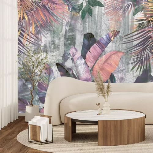 Papier peint  Feuilles colorées de palmier et de bananier sur fond en béton