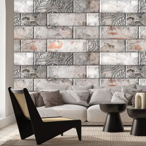 Papier peint  Mur en briques avec un ornement délicat