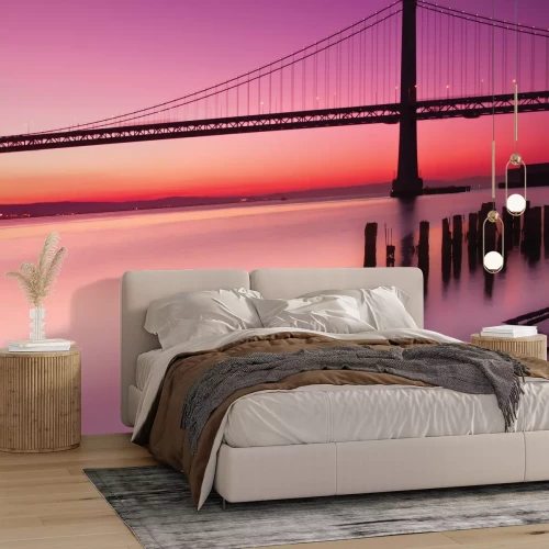 Papier peint  Paysage avec coucher de soleil et un pont sur fond de ciel rose