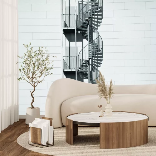 Papier peint  Escalier en colimaçon sur un mur en briques blanches