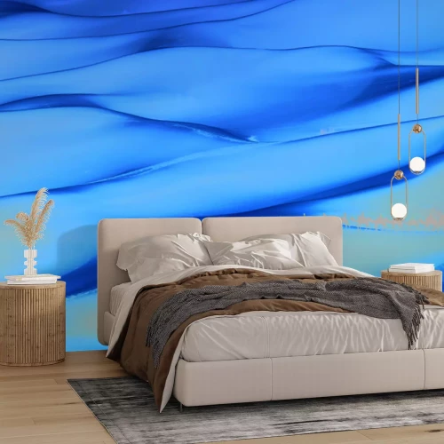 Papier peint  Chameaux marchant à travers un vaste désert