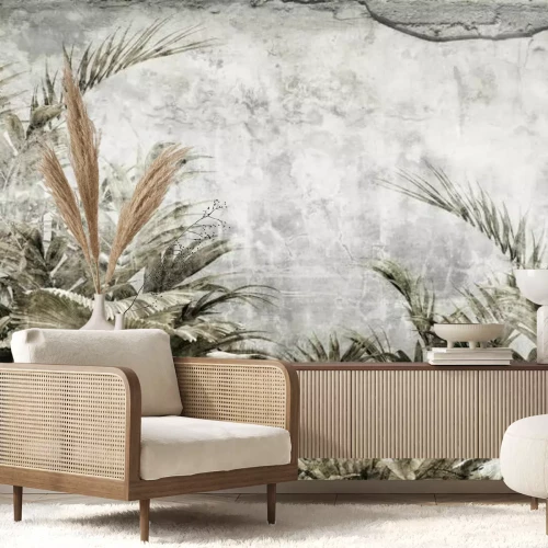 Papier peint  Feuilles tropicales sur fond en béton