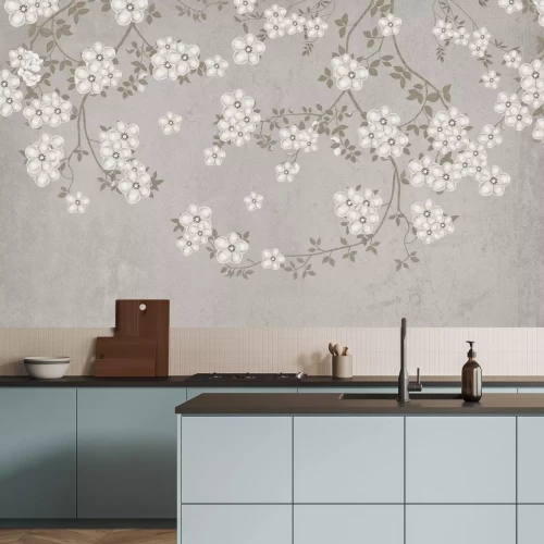 Papier peint  Branches avec des fleurs blanches sur béton