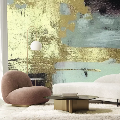 Papier peint  Mur en béton avec décoration dorée