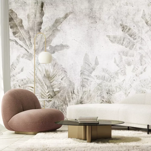 Papier peint  Feuilles de palmier sur fond béton