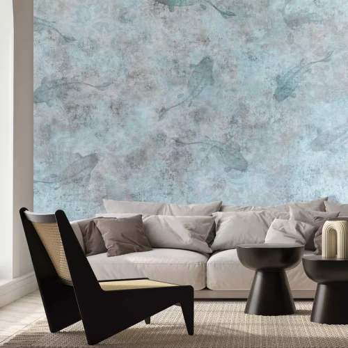 Papier peint  Poissons sur fond de béton dans des tons de bleu