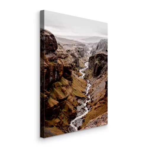 Tableau  Une rivière dans une vallée de montagne rocheuse