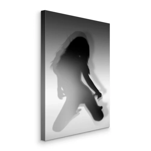 Tableau  La silhouette d'une femme agenouillée dans un doux dégradé de gris.