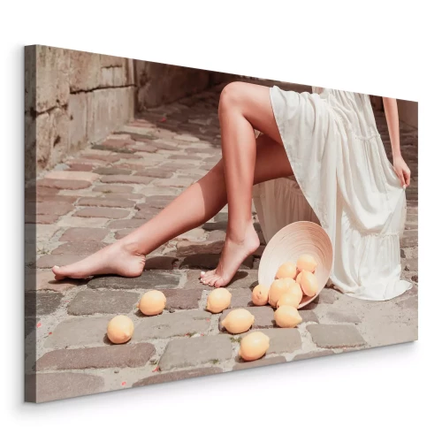 Tableau  Des citrons éparpillés autour des jambes du mannequin