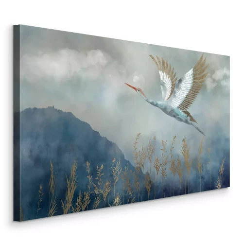 Tableau  Une grue en vol se détachant sur un ciel gris et des montagnes