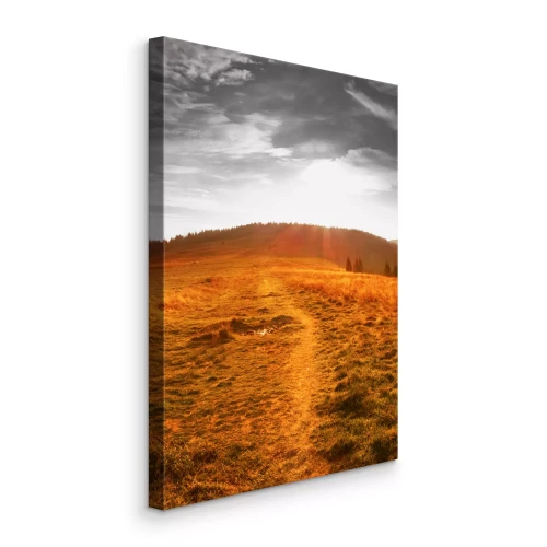 Tableau  Une clairière au coucher du soleil, traversée par un sentier.