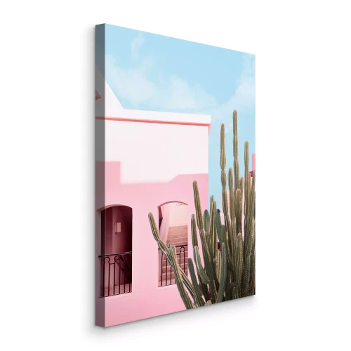Tableau  Une maison rose et un cactus sur fond de ciel bleu