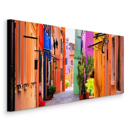 Tableau  La rue étroite de Burano à Venise avec ses bâtiments colorés