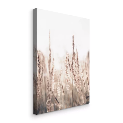 Tableau  De délicats brins d'herbe se détachent sur un fond clair.