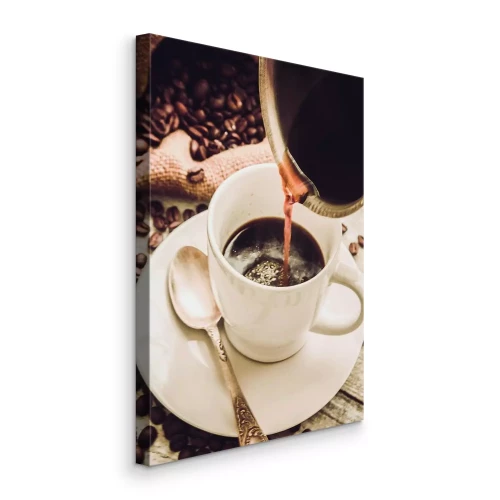 Tableau  Une tasse de café avec des grains en arrière-plan