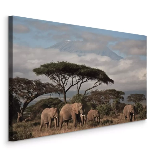 Tableau  Éléphants majestueux se détachant sur fond d'arbres et de montagnes